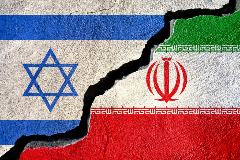 Concept Iran and Israel flag on cracked background